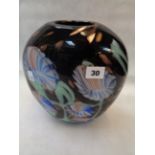 Circular Art Glass Slab Vase of black ground and multi coloured flowers, 25cm in Height, Condition -