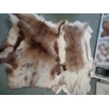 2 Reindeer pelt rugs of Beige and brown ground, Condition - Good Overall