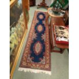 20thC Blue Ground Runner with floral detail, 290cm in Length