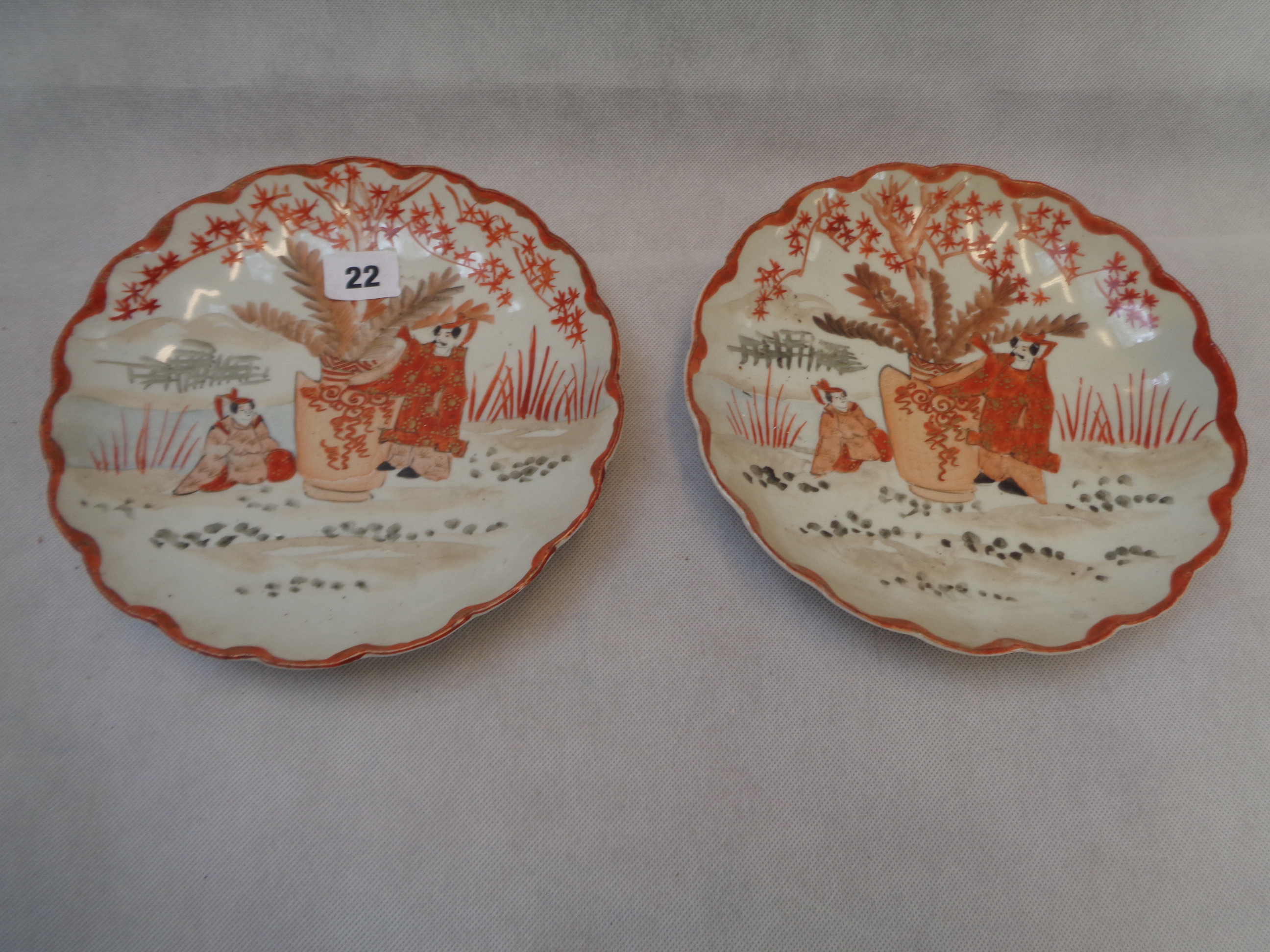 Pair of Japanese Kutani figural decorated plates with lobed edges and 2 Pairs of Satsuma Vases,