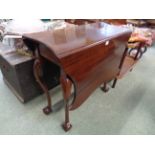 Good Quality Mahogany shaped top drop leaf table on curved ball and claw feet