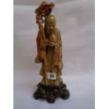 Chinese Carved 2 tone soapstone figure of a Wiseman holding pomegranate and staff mounted on