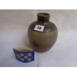 Helen Martino Blue glazed envelope vase with chequered decoration and impressed mark to base and a 2