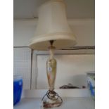 Large Onyx turned table lamp with brass fitting and cream shade