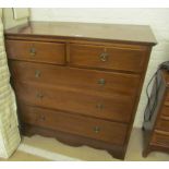An Edwardian mahogany chest of two short and three long drawers