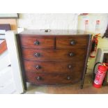 An early 19th Century bowfronted chest of two short and three long drawers with barleytwist side