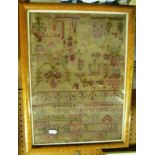 A 19th Century alphabet sampler by Betty Schilds Age 16 dated 1830 with numbers, birds, trees and