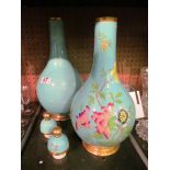 Two 19th Century continental porcelain lidded bottle vases turquoise ground one plain the other