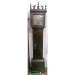 An 18th Century oak Longcase clock with long pendulum door, silvered dial and eight day striking