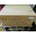 A wooden case of six bottles of Les Jardin du Tertre 1995.