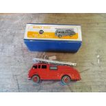 A Dinky Toys fire engine with extending ladder No. 555 in original box