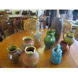 Some antique pottery jugs and vases