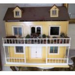 A fully furnished modern dolls house