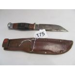 A 'Boone' knife Wade and Butler in leather scabbard