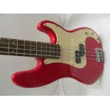 A Squier P Bass by Fender electric guitar (i.c)