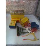 A Dinky trailor (boxed) together with a Crescent Toys part tractor and two Brittains horse carts,