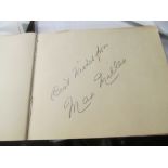 An autograph album including Max Miller.