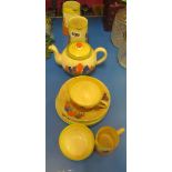 A Clarice Cliff crocus pattern part tea set including teapot