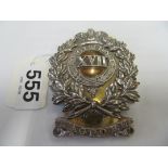 A scarce Victorian silver mounted gilt metal Leicestershire 17th Regiment helmet plate badge with