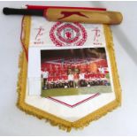 A Manchester United pennant signed by Alex Ferguson and a signed team photograph 1997-1998, and a