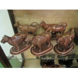 Ten black and brown cow creamers (s/a/f).