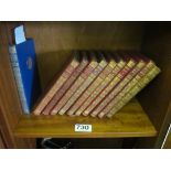 A set of Rudyard Kipling leather and gilt bound books and a leather bound Paris sketch book by