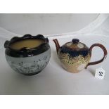 A Doulton Lambeth stoneware teapot and a Langley Pottery jardinière (a/f)