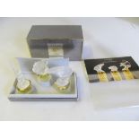 Three Lalique Parfums scent bottles, boxed