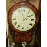 A drop dial wall clock in flame mahogany case.