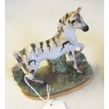 A Staffordshire style model Zebra