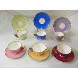 A set of six Royal Worcester butterfly wing harlequin coloured cups and saucers