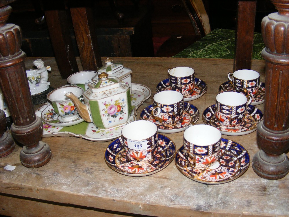 Selection of Royal Crown Derby cups and saucers, etc.