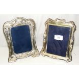 Two decorative embossed silver mounted photo frames
