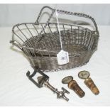 A plated basket-weave wine bottle cradle, a Yates bottle tap and two mother-of-pearl mounted "