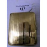 An engine turned 9ct gold cigarette case - 58 grams