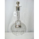 A "balloon" decanter with long faceted neck and flared silver mount, complete with silver stopper