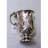 An embossed and engraved Victorian silver christening cup - London 1869