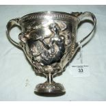 A 19th century two-handled sterling silver cup by Oomersi Mawji, Royal Silversmith to the Maharaos