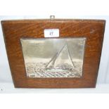 A 13cm x 17cm embossed silver yachting trophy "Squibb - W.O.D., 2nd 1926" on oak plaque