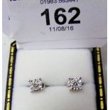 A pair of approximately .22 carat diamond stud earrings