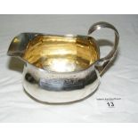 A George III silver cream jug - Edinburgh 1816