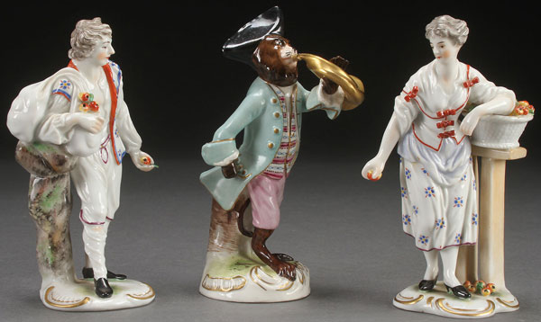 A GROUP OF THREE VICTORIAN PORCELAIN FIGURES. Comprising a Meissen style figural monkey with horn