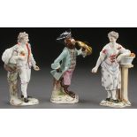 A GROUP OF THREE VICTORIAN PORCELAIN FIGURES. Comprising a Meissen style figural monkey with horn