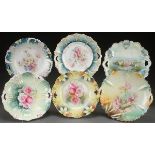 SIX R.S. PRUSSIA AND GERMANY CAKE PLATES, CIRCA 1900. Various molds including floral, medallion and