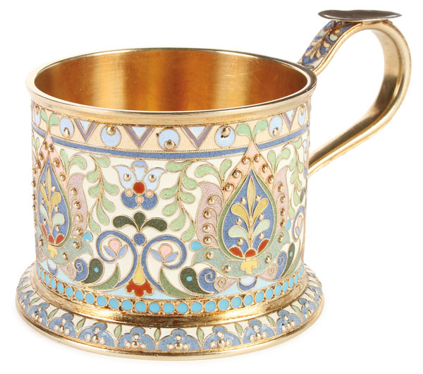 A VERY FINE SILVER GILT AND ENAMELED TEA GLASS HOLDER, OVCHINNIKOV, MOSCOW, 1908-1917. The heavy