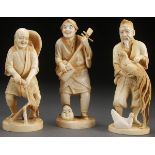 A VERY FINE GROUP OF THREE JAPANESE CARVED IVORY OKIMONOS, PROBABLY MEIJI. Each well carved and