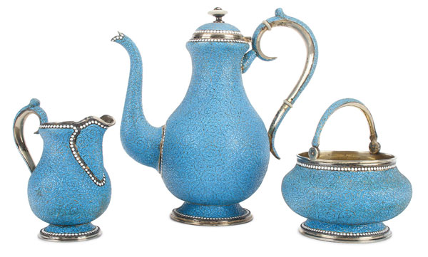 A FINE RUSSIAN SILVER AND ENAMEL THREE PIECE TEA SET, MOSCOW, 1899-1908. Comprising a lidded