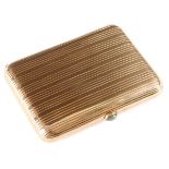 A HEAVY GOLD CIGARETTE CASE, PROBABLY RUSSIAN. Of rectangular form with rounded corners and overall