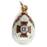 A RUSSIAN GOLD AND GUILLOCHÉ ENAMEL PENDANT EGG OF THE ORDER OF ST. VLADIMIR, ST. PETERSBURG, 1898-