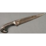 A NIELLO AND DAMASCUS BLADE RAMS HEAD DAGGER. The extensively nielloed handle with rams head pommel